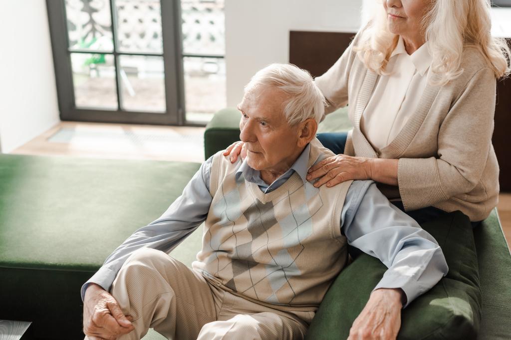 senior couple doing massage and chilling at home on self isolation - Photo, Image