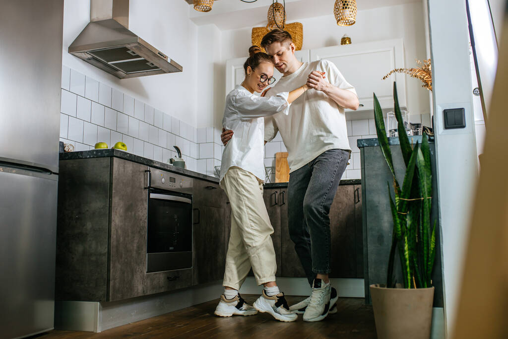couple dance at home, they are happy together - Photo, Image