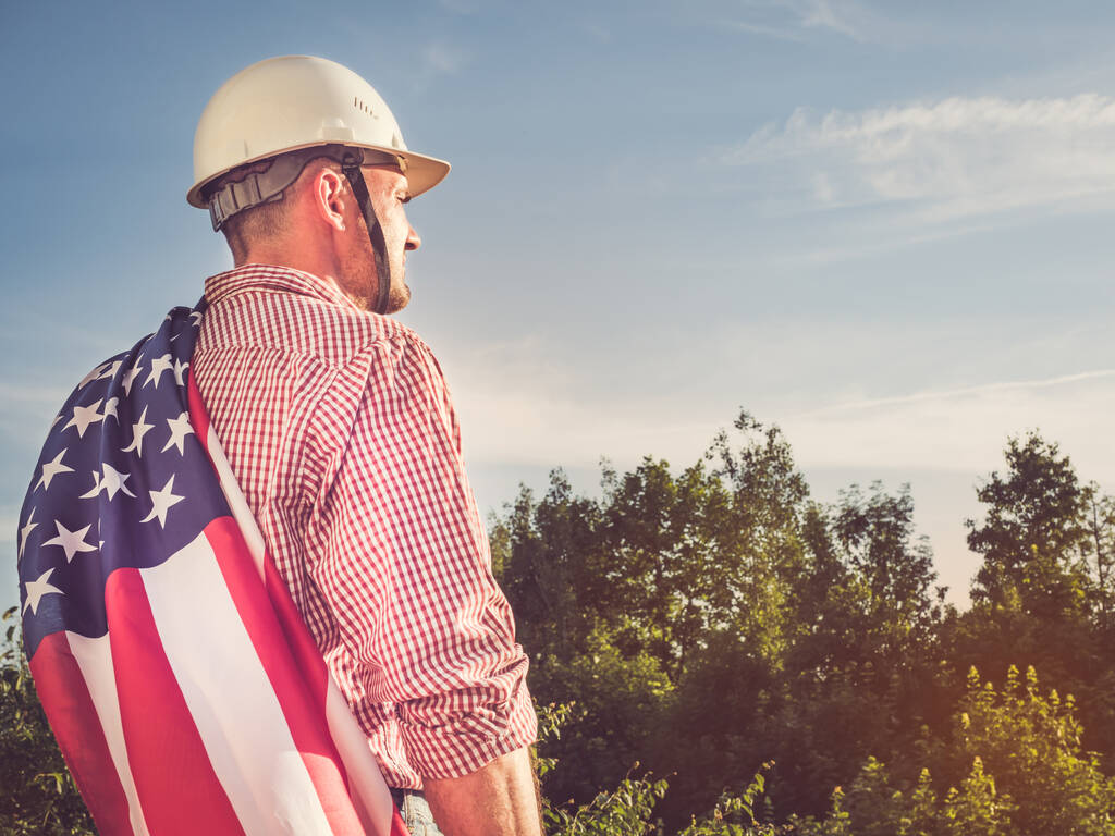 Jeune ingénieur, casque blanc et drapeau américain
 - Photo, image