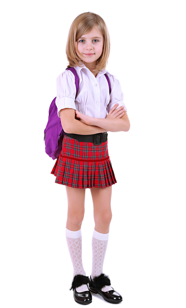 Красива маленька дівчинка з рюкзаком ізольована на білому
 - Фото, зображення