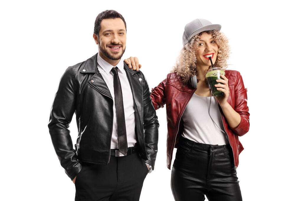 Hipsters man and woman with a green smoothie isolated on white background - Photo, Image