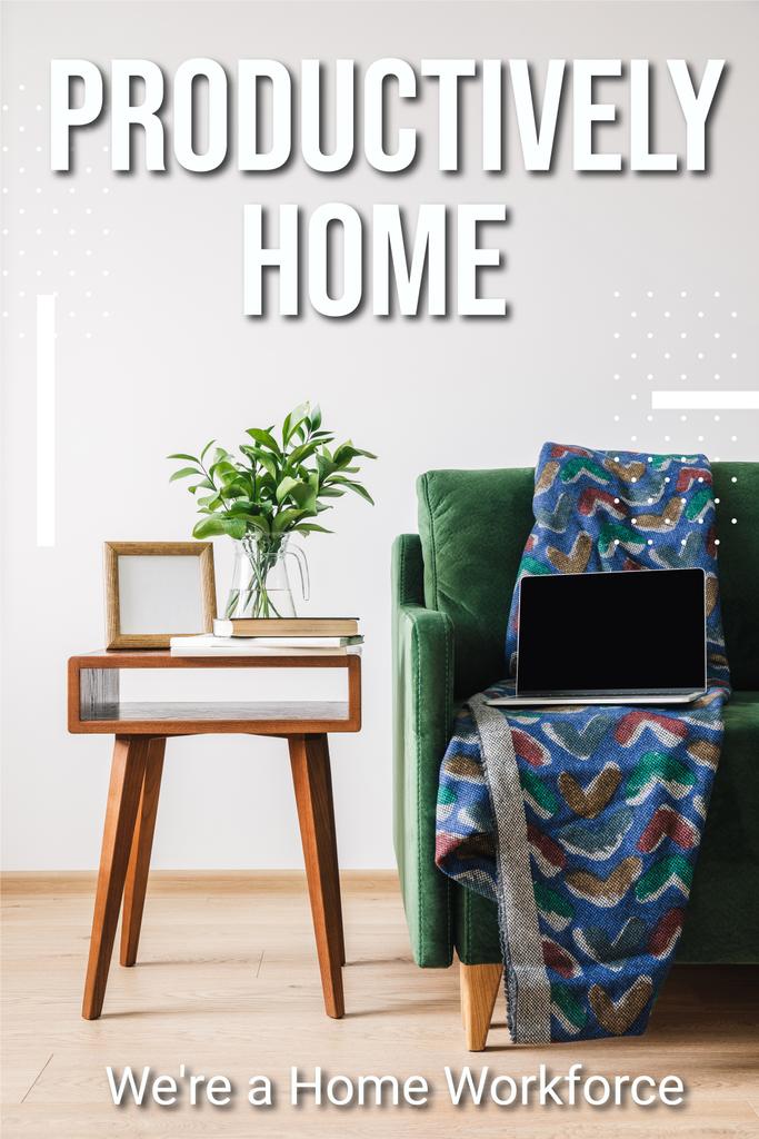 green sofa, blanket and laptop with blank screen near wooden coffee table with green plant, books, photo frame and productively home, were a home workforce lettering  - Photo, Image