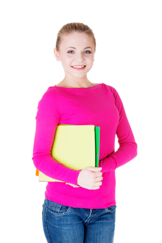 Jeune étudiante femme avec cahier d'exercices
. - Photo, image