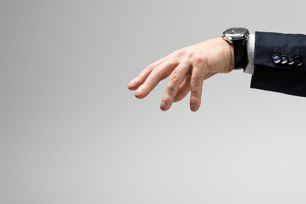 visão recortada de empresário manipulando com a mão isolada em cinza
 - Foto, Imagem