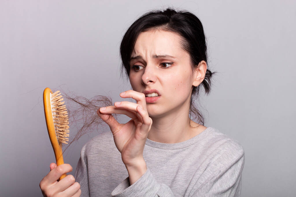 Bad hair care, hair on the comb - Photo, Image