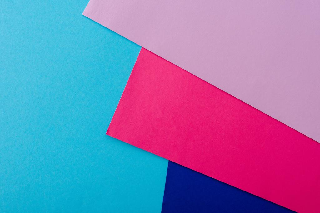 fond géométrique abstrait avec papier rose, bleu et violet - Photo, image