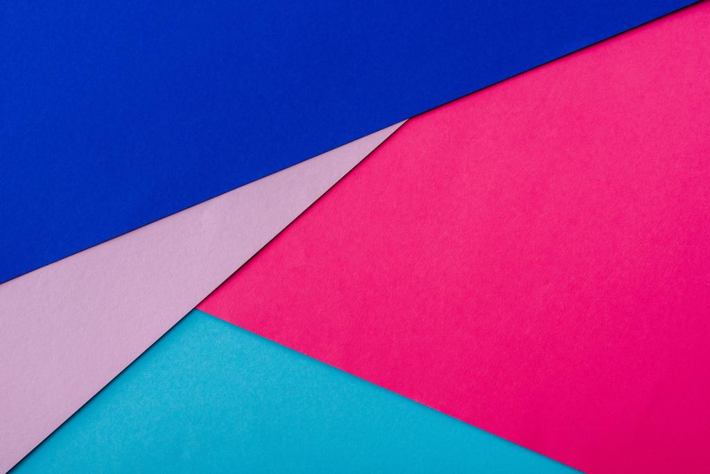 ピンク、青、紫の紙で抽象的な幾何学的背景 - 写真・画像