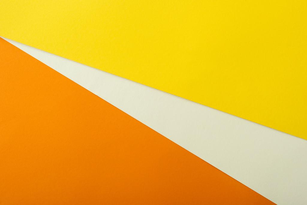 fondo geométrico abstracto con papel brillante blanco, amarillo y naranja
 - Foto, imagen