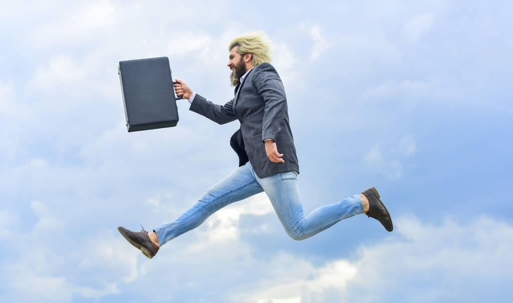 Businessman run away business case. Feel impact. Hipster hold briefcase. Happy worker. Freedom. Feeling free. Energetic entrepreneur. Business man formal suit carries briefcase. Illegal deal business - Photo, Image