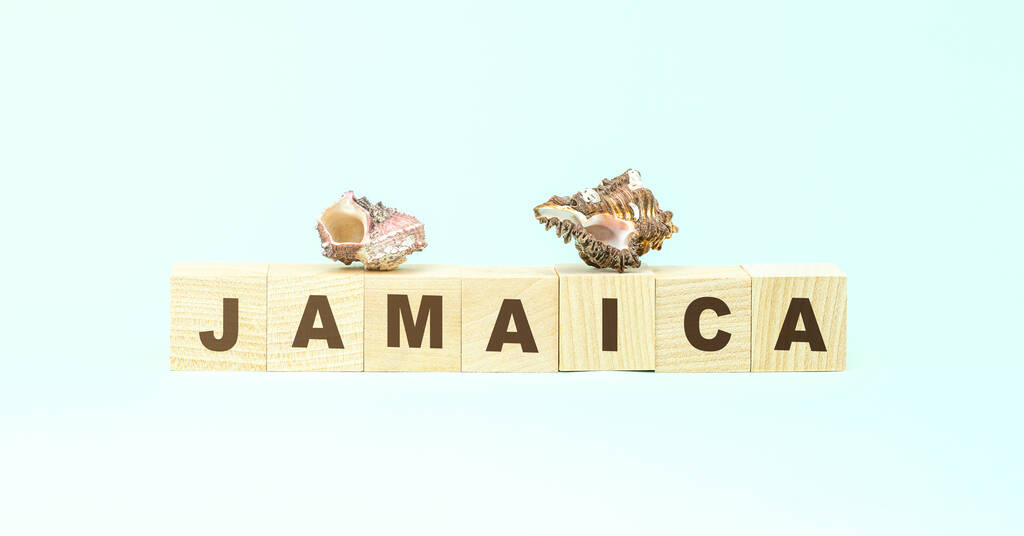 palavra Jamaica com cubos de madeira e conchas em turquesa
 - Foto, Imagem