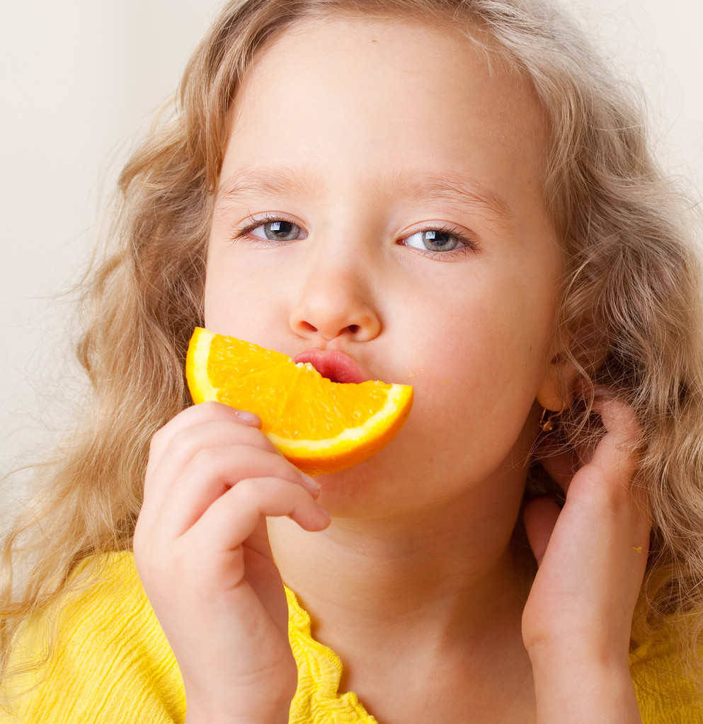 Enfant aux oranges
 - Photo, image