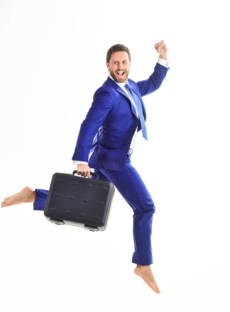 Business and success concept. Businessman with happy face jump. - Photo, Image