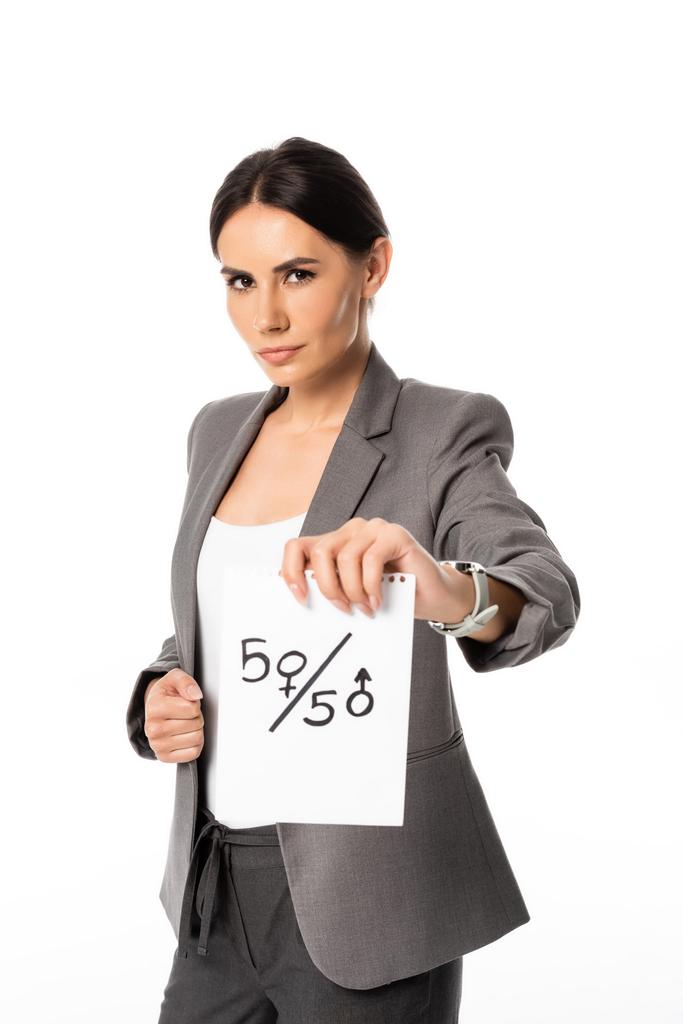 beautiful businesswoman in suit holding paper with fifty-fifty symbols isolated on white, gender equality concept - Photo, Image