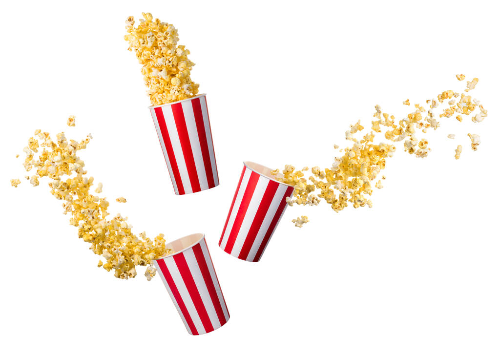Set vliegende popcorn van papier gestreepte emmers geïsoleerd op witte achtergrond - Foto, afbeelding