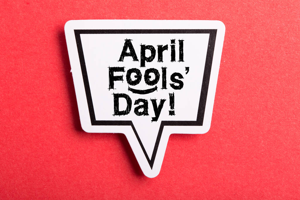 April Fools 'Day Speech Bubble isoliert auf rotem Hintergrund. - Foto, Bild