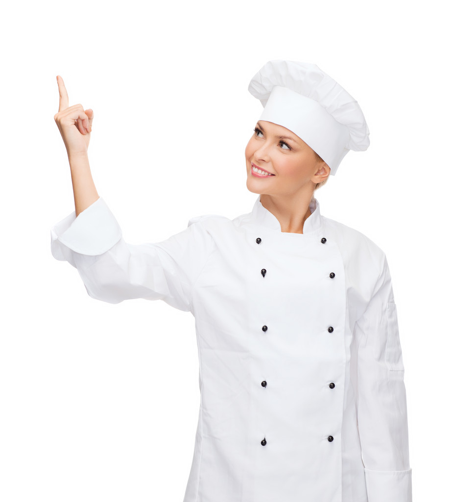 Chef sonriente señalando con el dedo a sonething
 - Foto, imagen