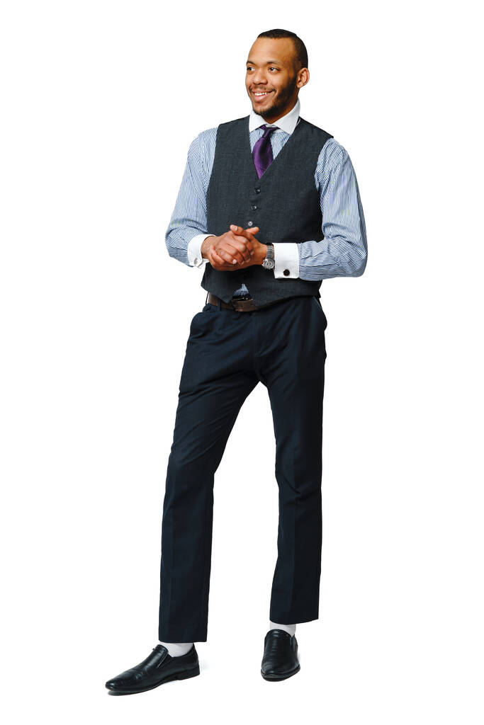 estudio de larga duración de un hombre de negocios afroamericano aislado sobre fondo blanco
 - Foto, Imagen