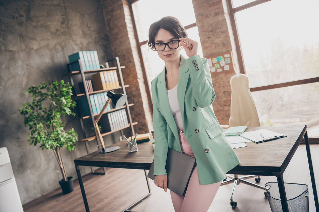 Photo of beautiful business lady hold notebook self-confident person chief insurance agent home remote distance work wear specs blazer near table modern interior home office indoors - Photo, Image