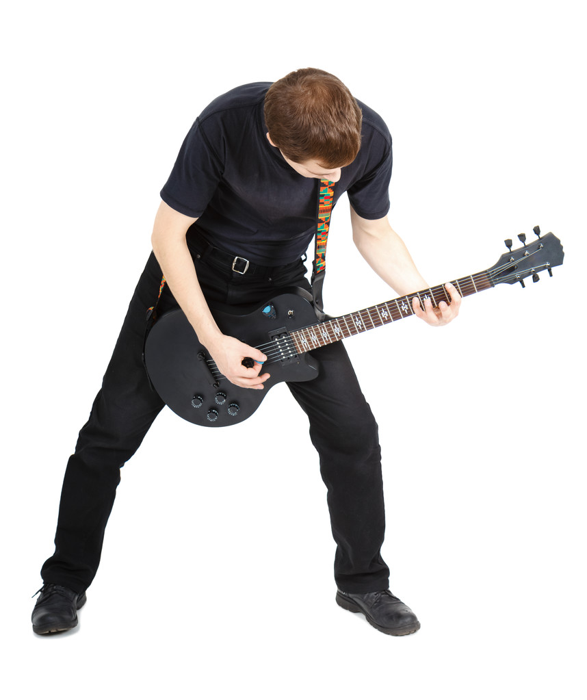 Az ember egy elektromos gitár - Fotó, kép