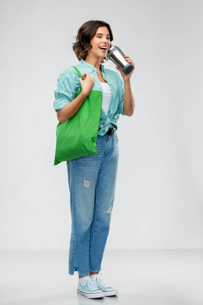 woman with bag for food shopping and tumbler - Photo, Image