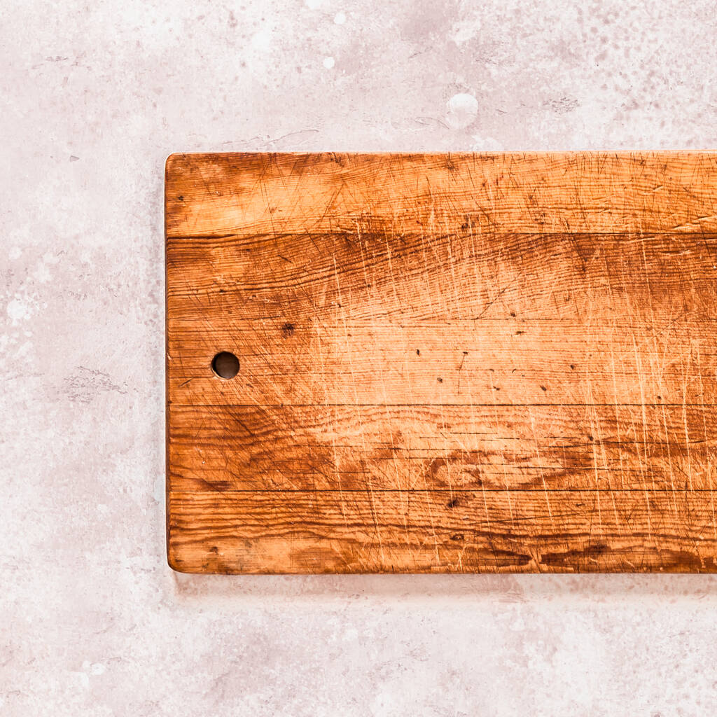 Old Chopping Board on Pink Concrete Background, square, copy space for your text - Photo, Image