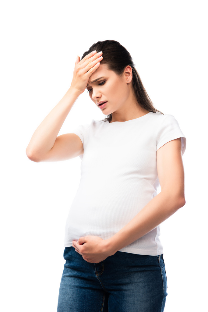 kimerült terhes nő fehér pólóban érintés fej elszigetelt fehér - Fotó, kép