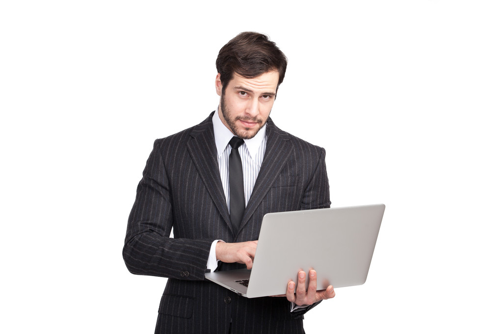 заинтересованный бизнесмен с ноутбуком
 - Фото, изображение
