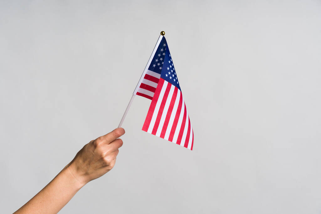 Human hand holding USA flag - Photo, Image