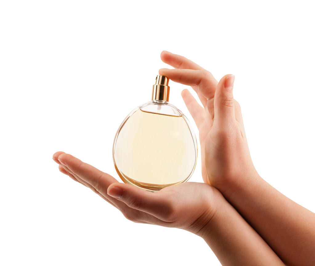 mains de femme pulvérisation de parfum - Photo, image