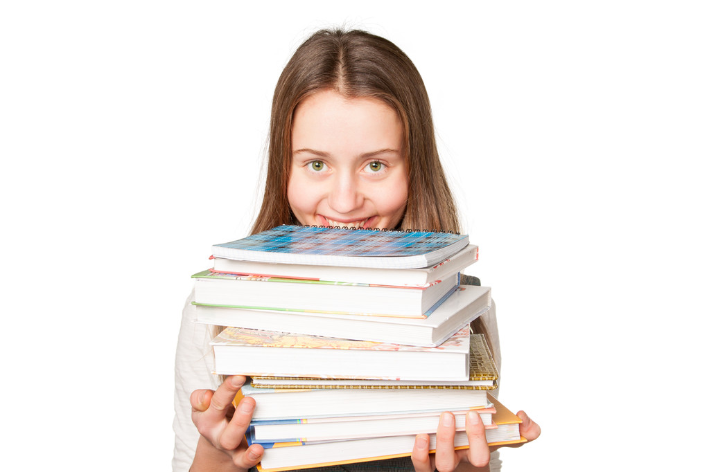 młoda dziewczyna z książek na białym tle nad białym - Zdjęcie, obraz