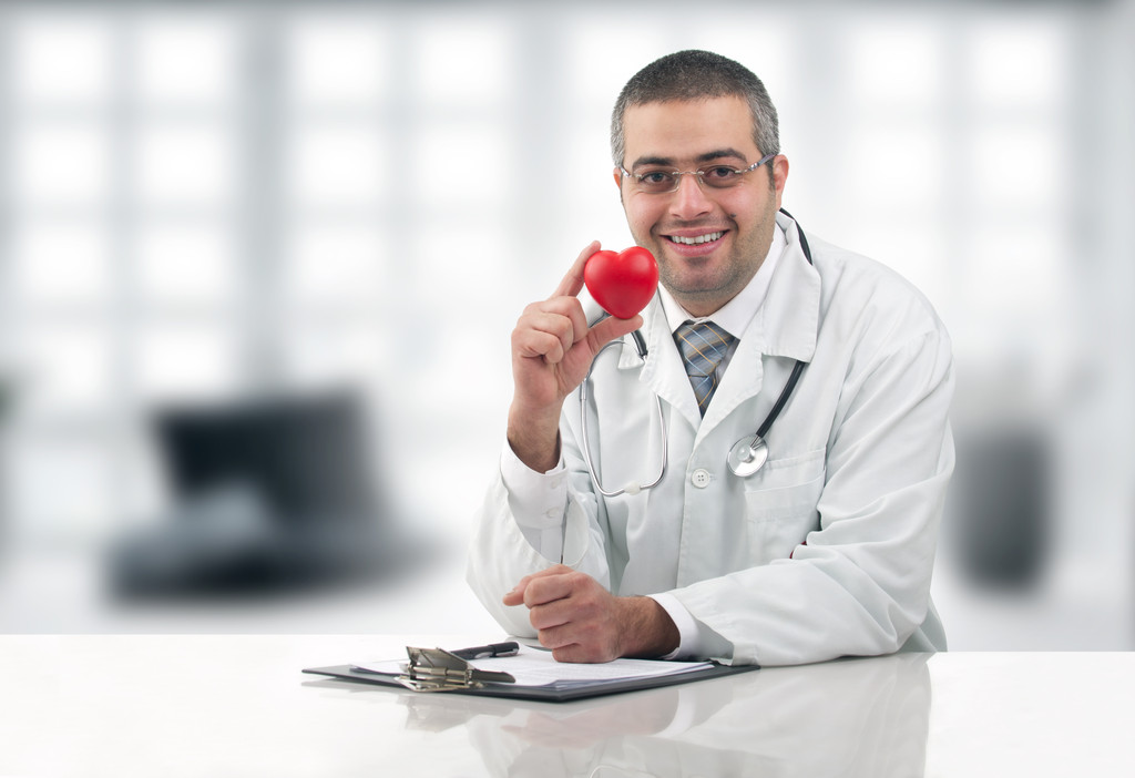Doctor holding heart - Photo, Image