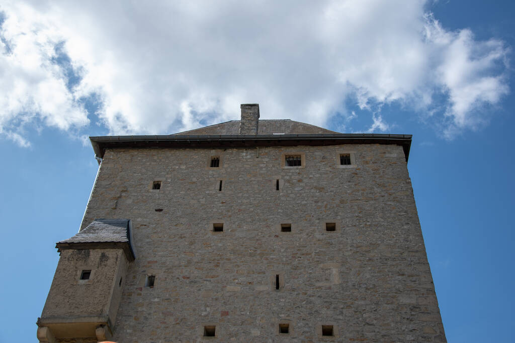 A low angle shot of loopholes of a medieval castle - Photo, Image