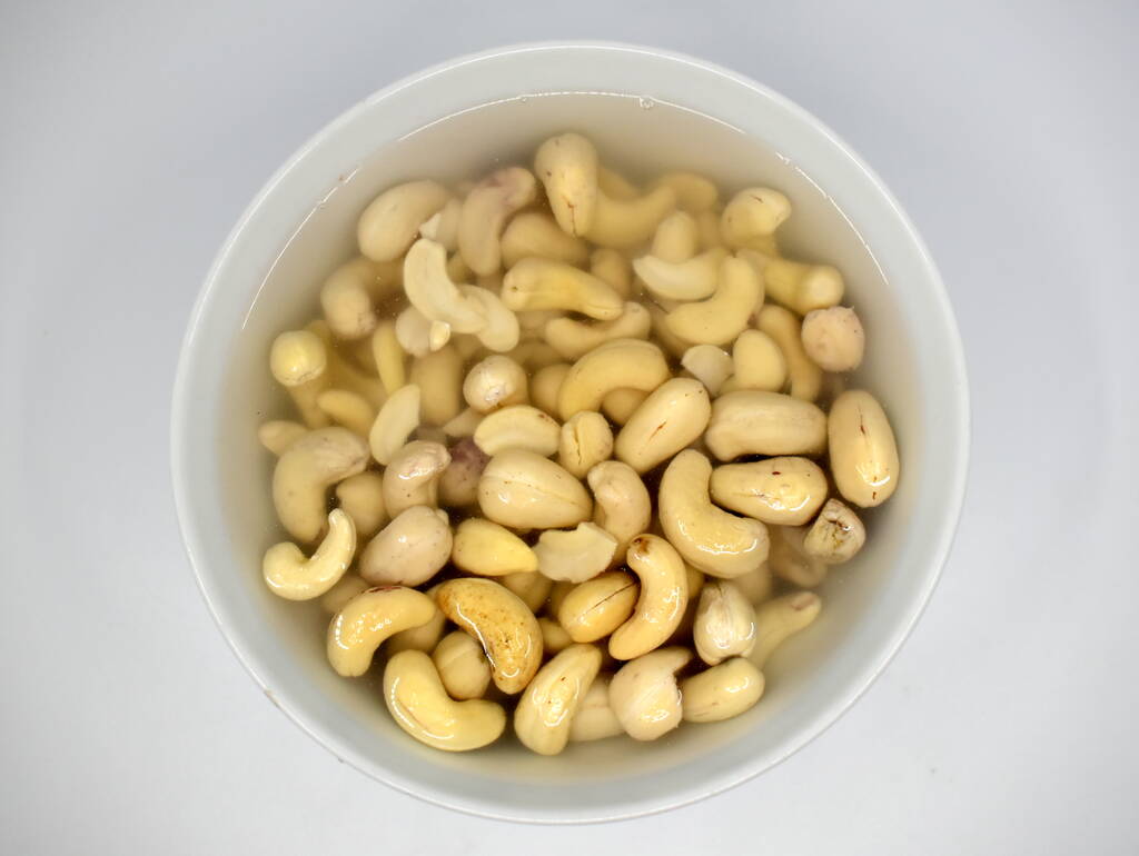 Cashew Nuts Soaked In Water For 12 Free Stock Photo and Image
