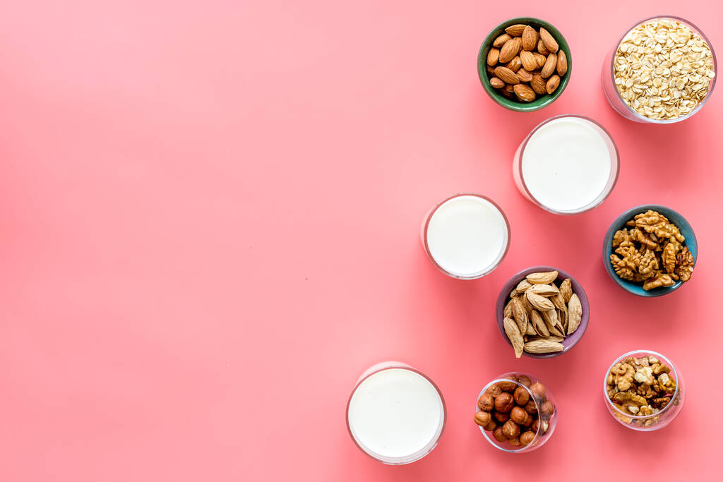 Vegan non-diary milk. Alternative types of milk with nuts and oat - Photo, Image