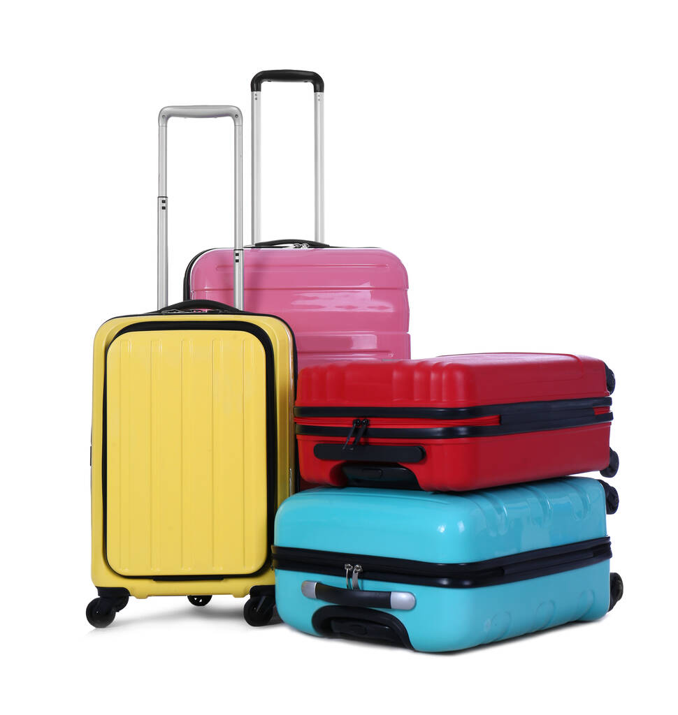 Κομψές βαλίτσες συσκευασμένες για ταξίδια σε λευκό φόντο. Καλοκαιρινές διακοπές - Φωτογραφία, εικόνα