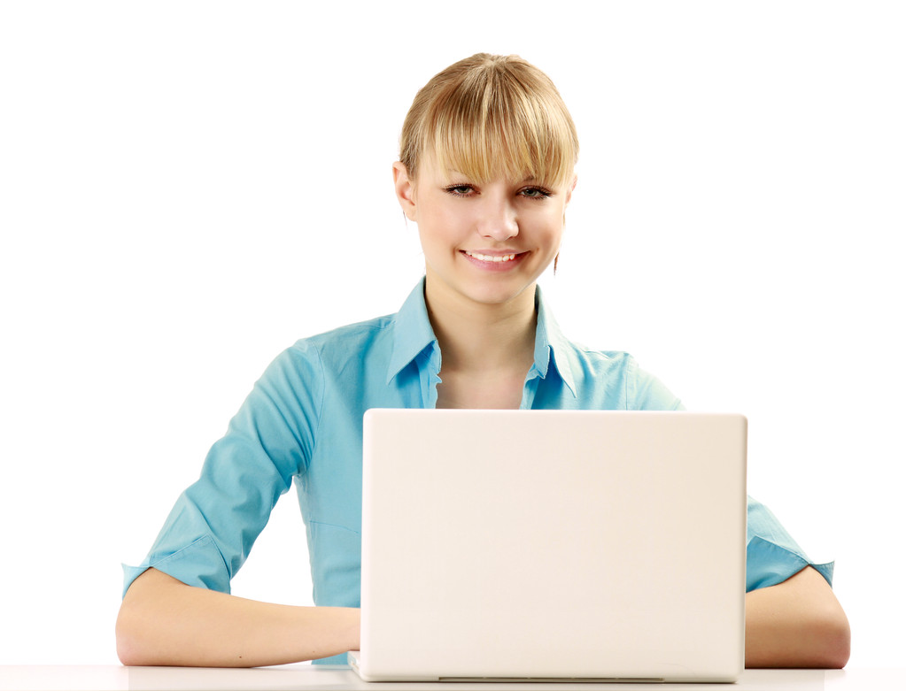 Woman sitting at a laptop computer - Photo, Image
