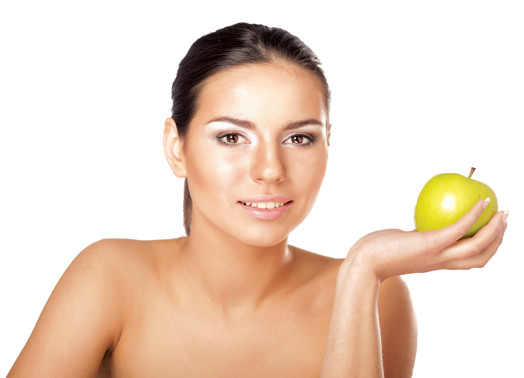 mujer joven con una manzana verde - Foto, Imagen