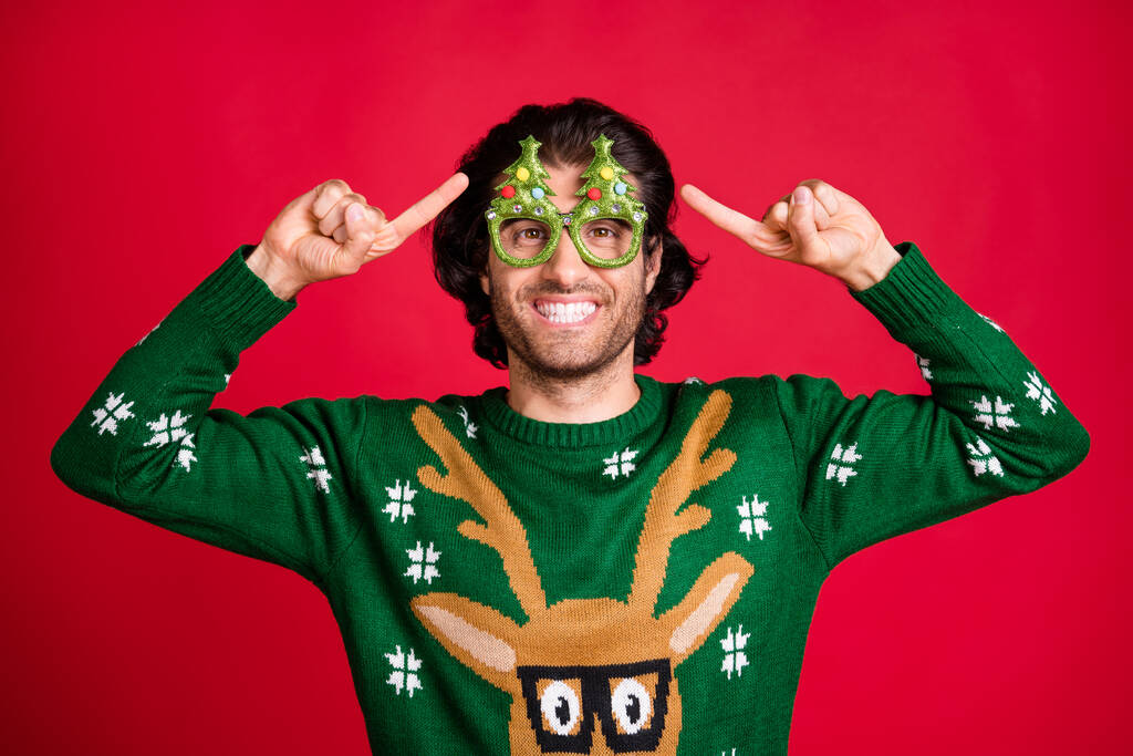 Close-up portrait of his he nice attractive glad content cheerful cheery brunet guy wearing demonstrating green childish specs isolated bright vivid shine vibrant red color background - Photo, Image