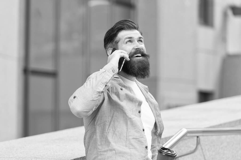 Do you hear me. Bearded man use smartphone outdoors. Mobile technology. New technology. Cellular technology. Modern life. Technology for communication - Photo, Image