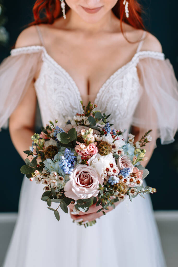 beautiful wedding bouquet in the hands of the bride - Photo, Image