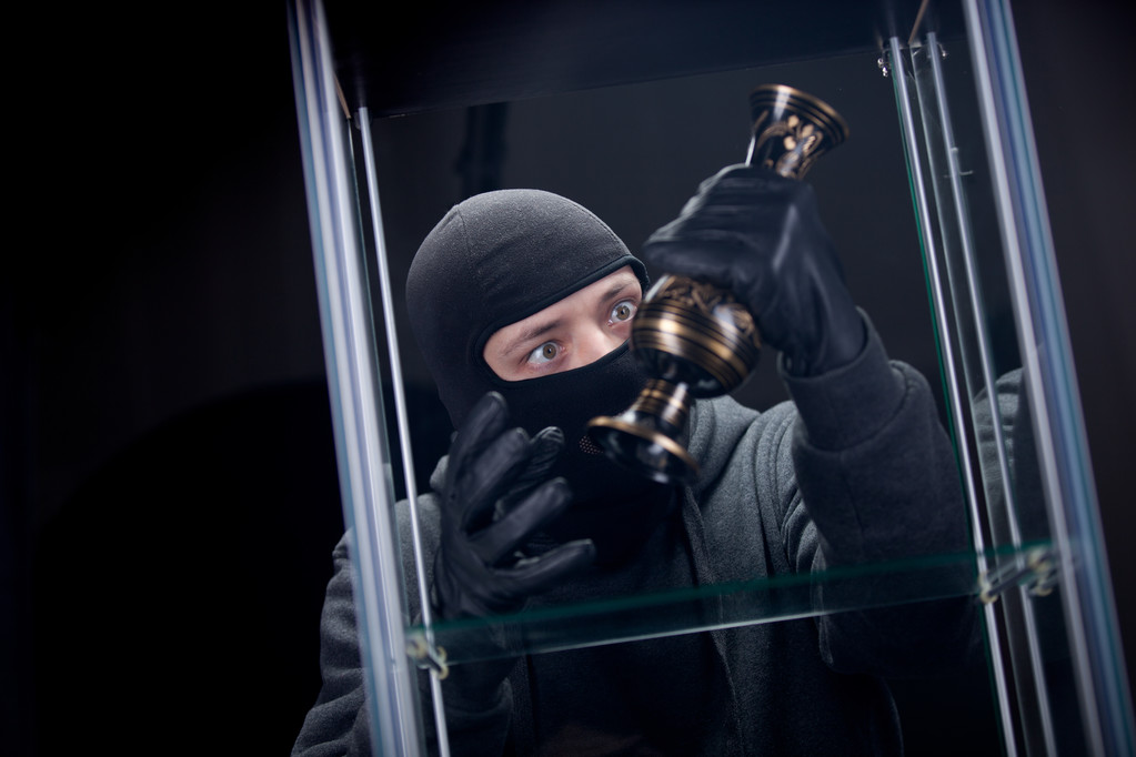 Einbrecher mit schwarzer Maske - Foto, Bild
