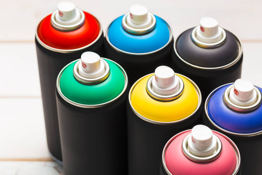 Pulverizar latas de pintura de cerca. Foto de alta calidad - Foto, Imagen