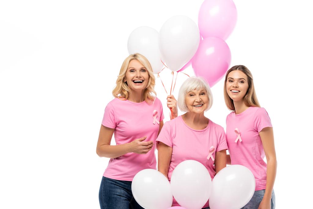 Göğüs kanseri kurdeleli kadınların elinde beyaz balonlar var. - Fotoğraf, Görsel