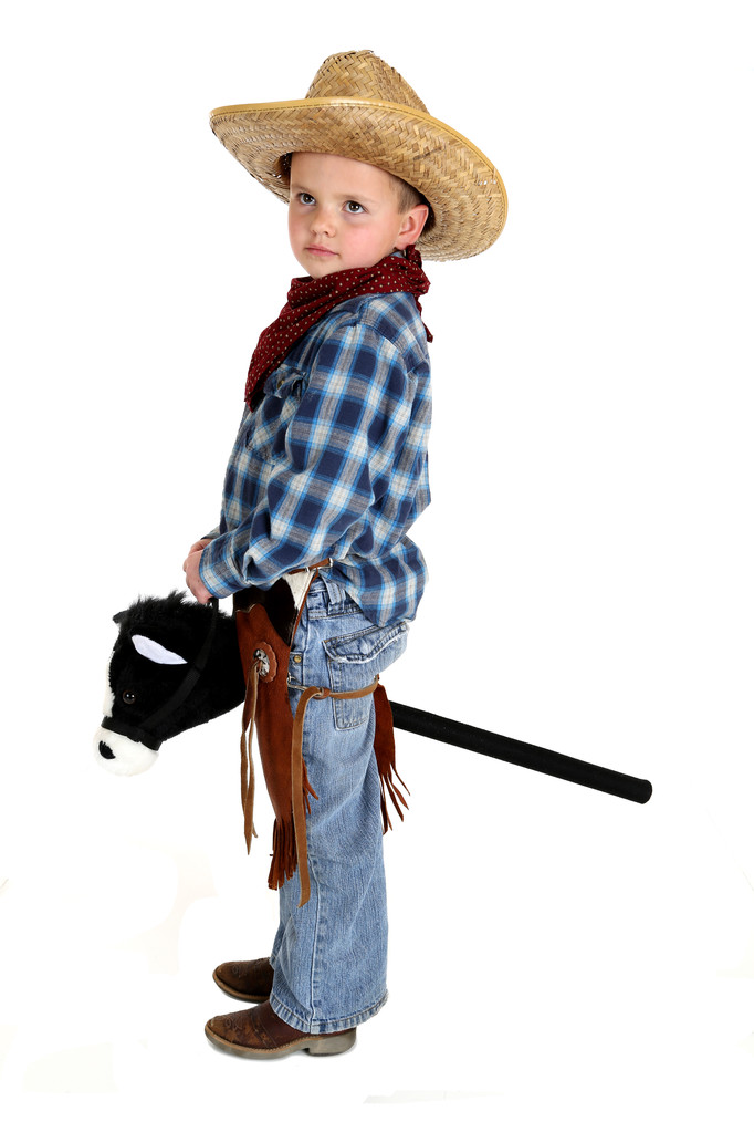 suloinen nuori cowboy ratsastus keppi hevonen oli kasvot
 - Valokuva, kuva