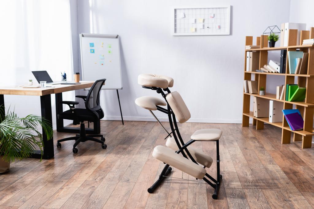 Interior of spacious office with modern design and massage chair - Photo, Image
