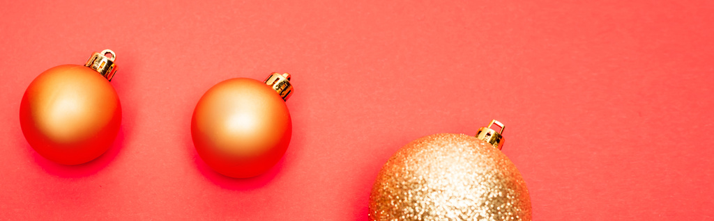top view of shiny baubles on red background, banner - Photo, Image