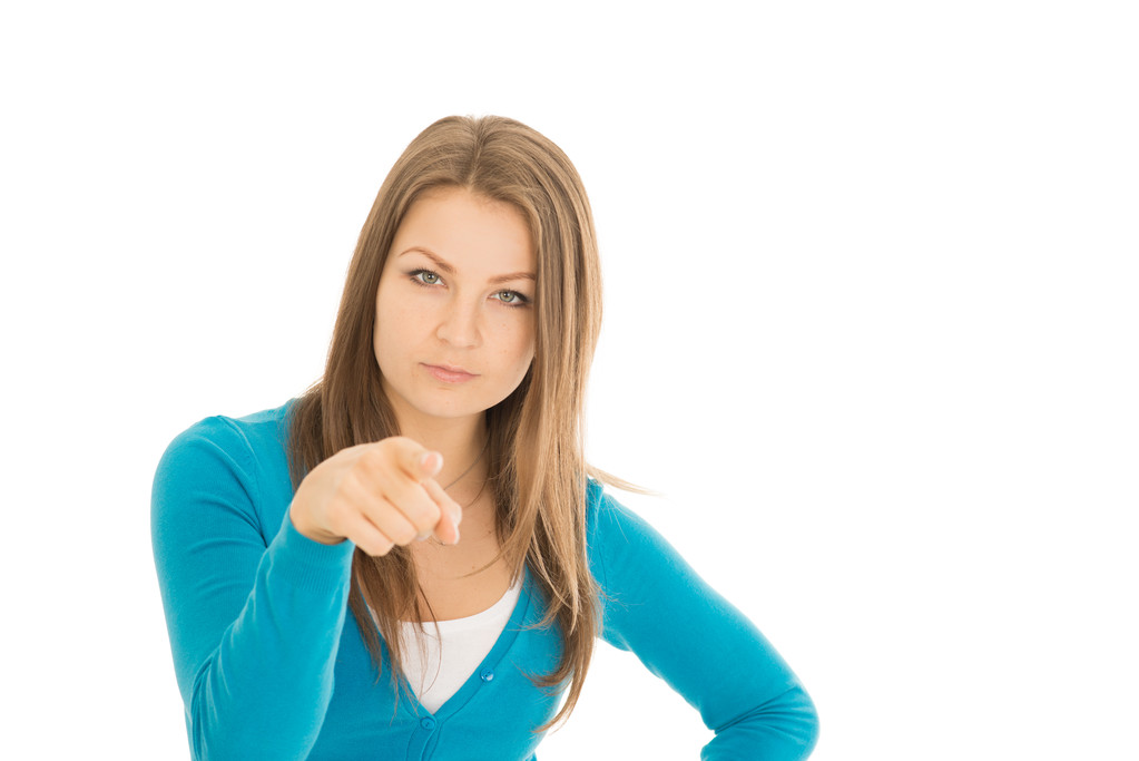 jovem mulher aponta um dedo
 - Foto, Imagem