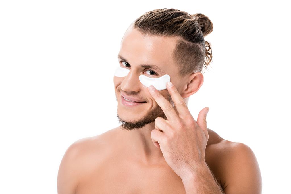 усміхнений сексуальний без сорочки чоловік очні плями на обличчі ізольовані на білому
 - Фото, зображення