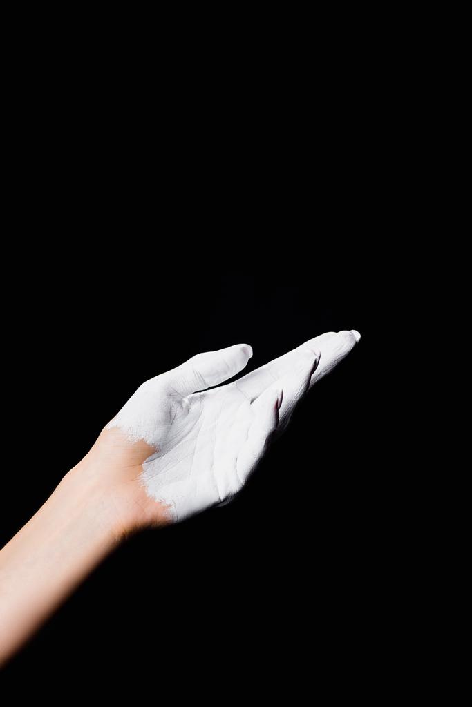 részleges kilátás fehér festett kéz elszigetelt fekete - Fotó, kép