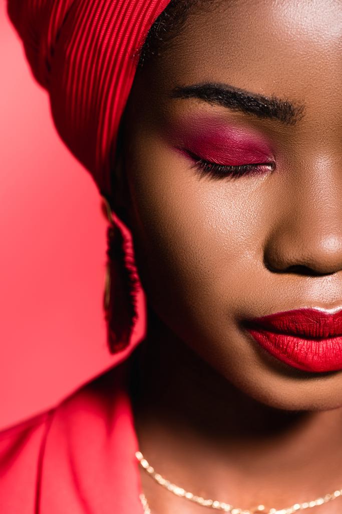 closeup of african american young woman with red makeup and closed eyes - Photo, Image